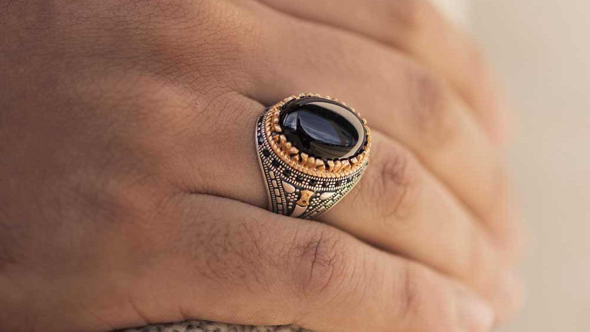 black aqeeq stone ring worn my man on ring finger