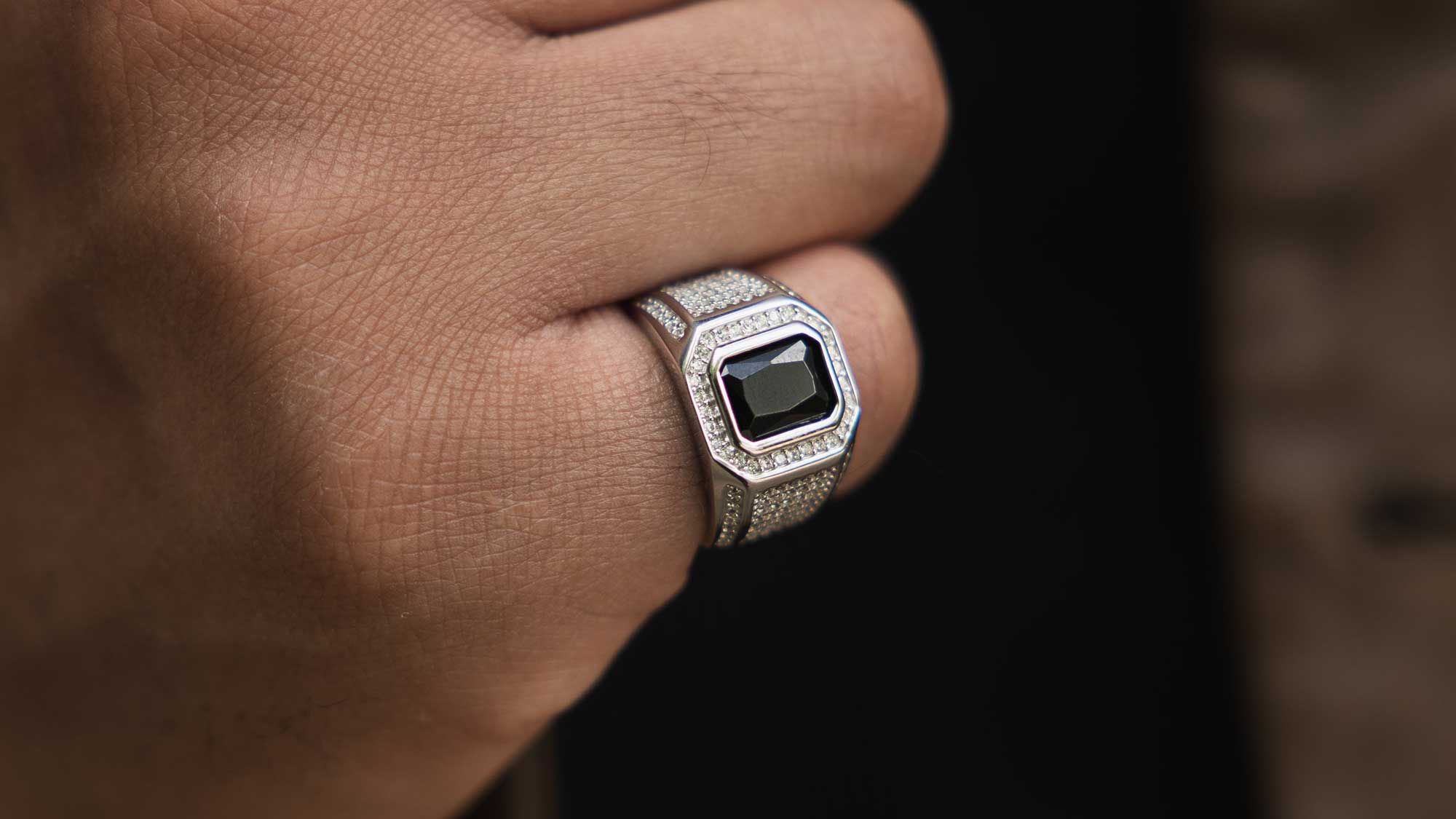 man wearing sterling silver adjustable ring for men